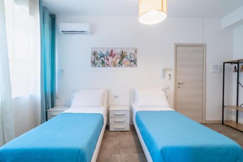 Postel nebo postele na pokoji v ubytování Agorà