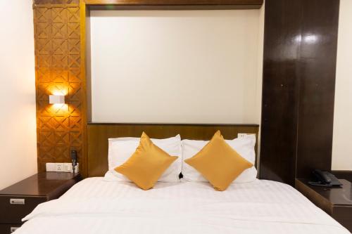 Ένα ή περισσότερα κρεβάτια σε δωμάτιο στο Atana Saigon Boutique Hotel II