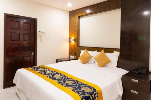 Ένα ή περισσότερα κρεβάτια σε δωμάτιο στο Atana Saigon Boutique Hotel II