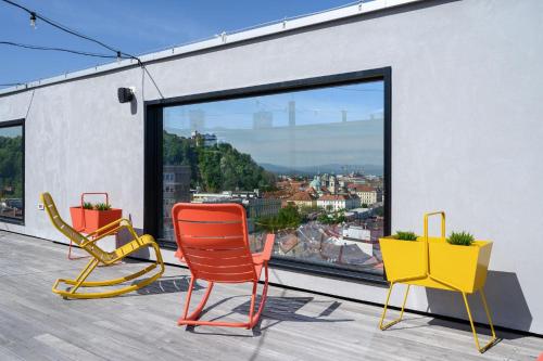 Un balcón o terraza en B&B Hotel Ljubljana Park