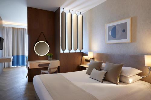 Katil atau katil-katil dalam bilik di Mediterranean Beach Hotel
