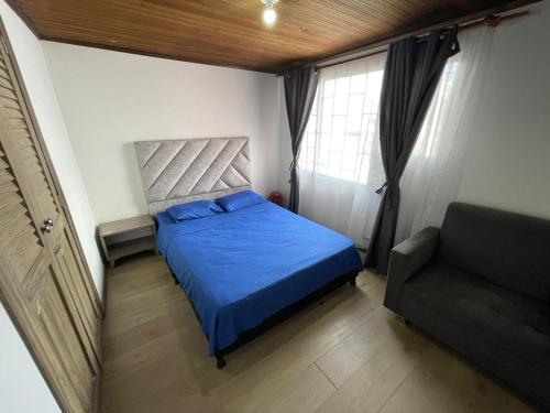 Postel nebo postele na pokoji v ubytování Hostel Titan Plaza Cll 80