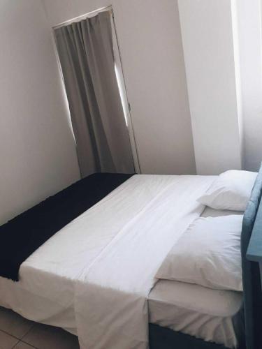 Ένα ή περισσότερα κρεβάτια σε δωμάτιο στο Apartments Nora 2