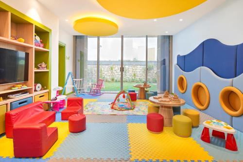 a childs play room with a lego theme at Voyage Torba Hotel in Torba