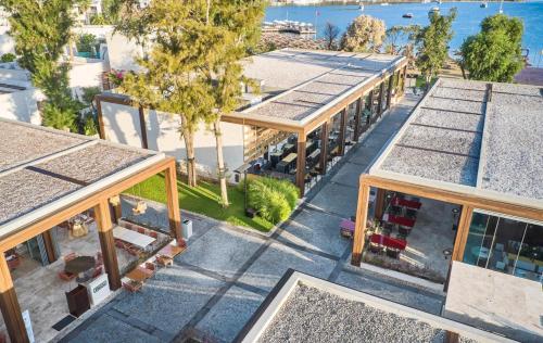 an overhead view of a building with solar panels on the roofs at Voyage Torba Hotel in Torba