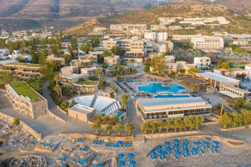 an aerial view of a resort with mountains in the background at Nana Golden Beach All Inclusive Resort & Spa in Hersonissos