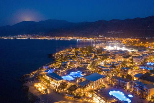 an aerial view of a city at night at Nana Golden Beach All Inclusive Resort & Spa in Hersonissos