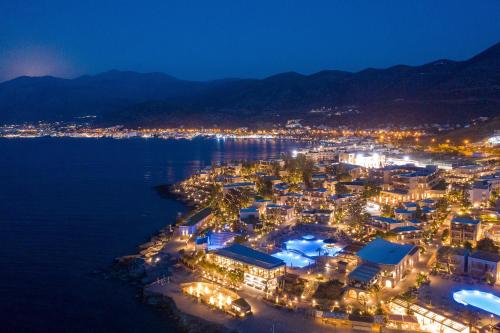 an aerial view of a city at night at Nana Golden Beach All Inclusive Resort & Spa in Hersonissos