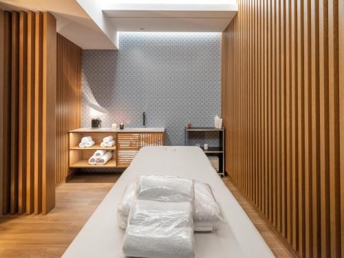a bedroom with a bed in a room at Nana Golden Beach All Inclusive Resort & Spa in Hersonissos