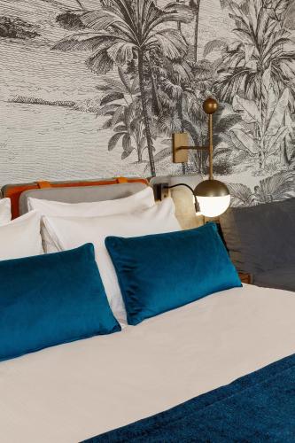 Ένα ή περισσότερα κρεβάτια σε δωμάτιο στο Sherwood Premio Hotel
