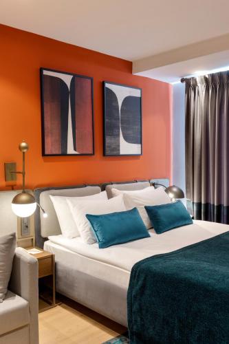 Ένα ή περισσότερα κρεβάτια σε δωμάτιο στο Sherwood Premio Hotel