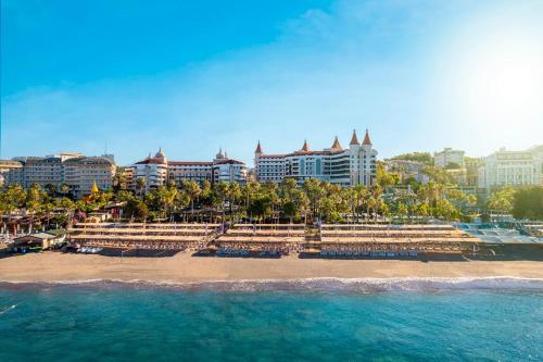 a view of a beach with buildings and the ocean at Leodikya Kirman Premium - Ultra All Inclusive in Okurcalar