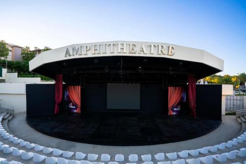an amphitheater with a sign on top of it at Leodikya Kirman Premium - Ultra All Inclusive in Okurcalar
