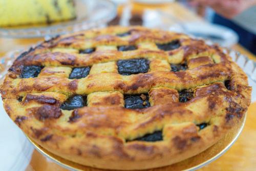 a pie sitting on a plate on a table at Tenuta San Lorenzo in Otranto