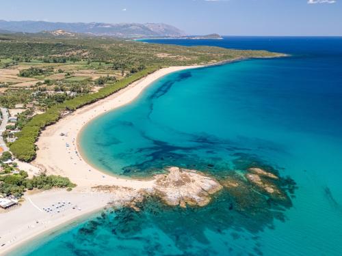 an aerial view of a beach and the ocean at Felix Hotels - Galanias Hotel & Retreat in Bari Sardo
