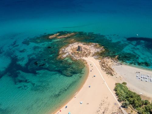 an aerial view of a beach and the ocean at Felix Hotels - Galanias Hotel & Retreat in Bari Sardo