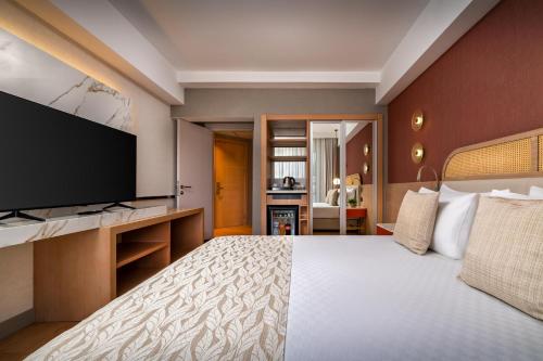 Televisyen dan/atau pusat hiburan di Trendy Palm Beach Adults Only