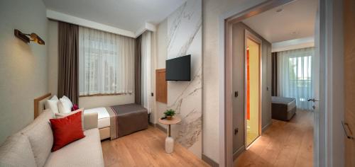 Televisyen dan/atau pusat hiburan di Trendy Palm Beach Adults Only