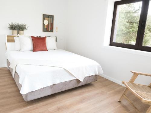 Ένα ή περισσότερα κρεβάτια σε δωμάτιο στο Hostel Retiro do Gerês