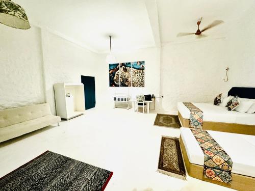 Cama ou camas em um quarto em Epic Wild Wilpattu
