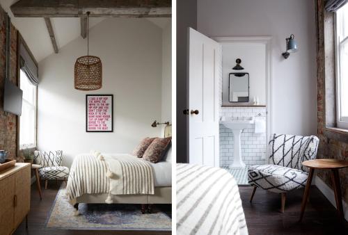 a bedroom and a living room with a bed and a chair at Artist Residence Bristol in Bristol