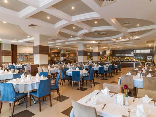 Restaurace v ubytování Calimera Hane Garden Hotel