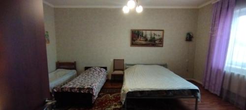 Ένα ή περισσότερα κρεβάτια σε δωμάτιο στο GuestHouse ED&ER near airport