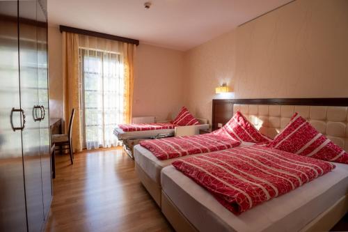 Ένα ή περισσότερα κρεβάτια σε δωμάτιο στο Vila Silva Marija Apartments
