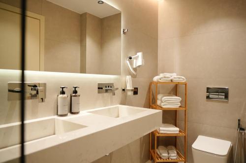 Koupelna v ubytování Hotel Natica