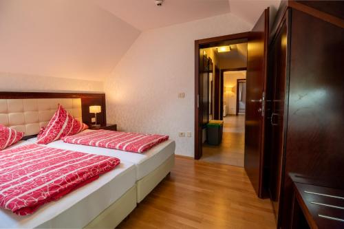 Ένα ή περισσότερα κρεβάτια σε δωμάτιο στο Vila Silva Marija Apartments