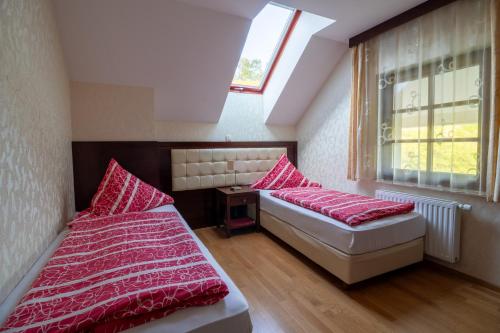 Ένα ή περισσότερα κρεβάτια σε δωμάτιο στο Vila Silva Marija Apartments