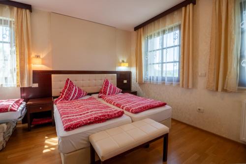 Ένα ή περισσότερα κρεβάτια σε δωμάτιο στο Vila Silva Marija Apartments