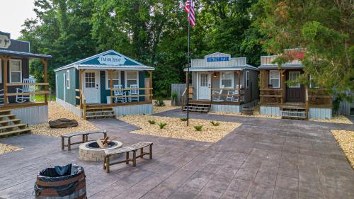 a group of tiny houses in a park at The Outpost in Grand Rivers