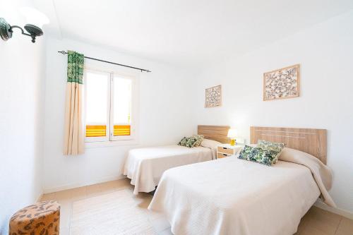 Postel nebo postele na pokoji v ubytování PA - El Palmeral Mojacar