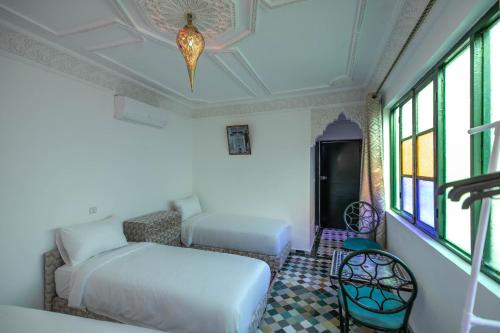 Katil atau katil-katil dalam bilik di Riad Dalla Fes
