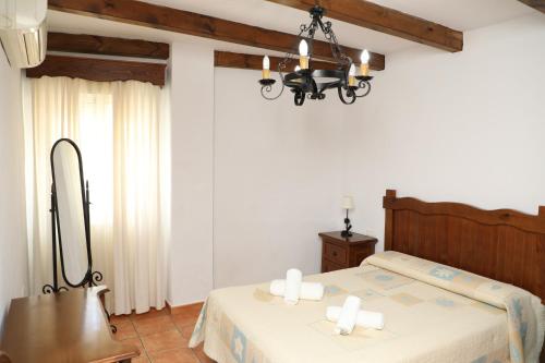 Ein Bett oder Betten in einem Zimmer der Unterkunft La Janda
