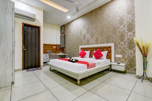 Ένα ή περισσότερα κρεβάτια σε δωμάτιο στο Super Hotel O Sky Land