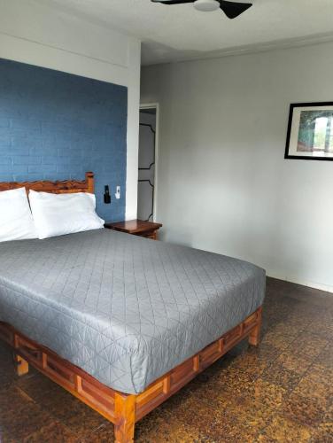 Ένα ή περισσότερα κρεβάτια σε δωμάτιο στο Hotel Bungalows La Era