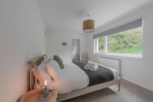 Postel nebo postele na pokoji v ubytování Heathercroft House-Modern 3 bedroom house with stunning views