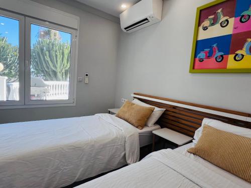 Apartments with tropical garden and sea water pool