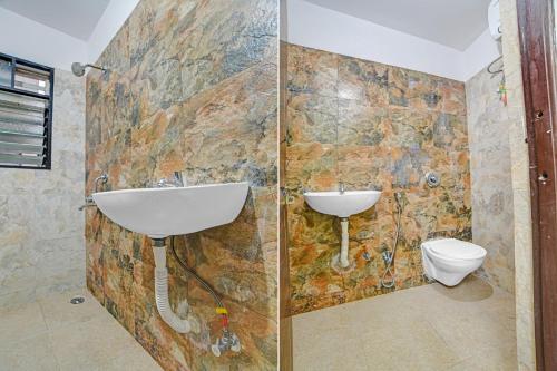 Un baño de Hotel O Trinity Inn