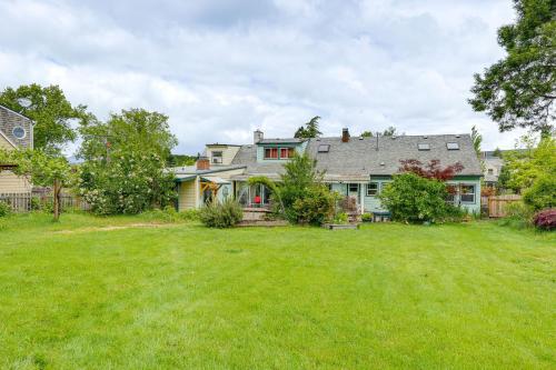 a large house with a large yard with a grass yard at Less Than half Mi to OSU Studio in Corvallis Near Parks in Corvallis