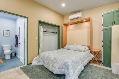 a bedroom with a bed and a bathroom at Less Than half Mi to OSU Studio in Corvallis Near Parks in Corvallis