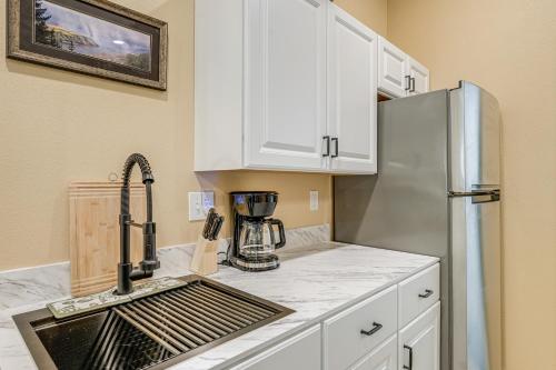 a kitchen with a sink and a refrigerator at Less Than half Mi to OSU Studio in Corvallis Near Parks in Corvallis