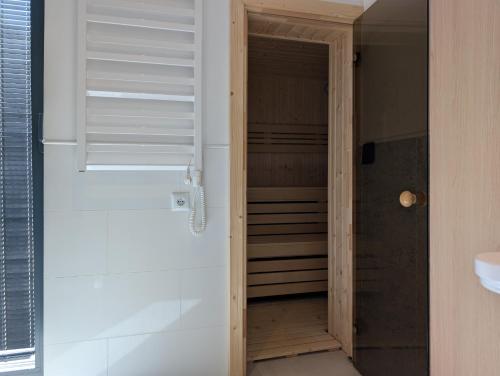a room with a door leading to a closet at Odpoczynek na wsi 