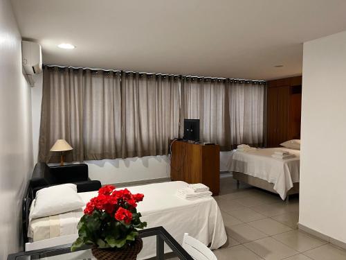 Postel nebo postele na pokoji v ubytování Mansoori Apart Hotel II