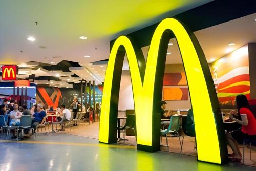 a mcdonalds restaurant with a yellow mcdonalds sign at Luxury Stay By Times Square Kuala Lumpur in Kuala Lumpur