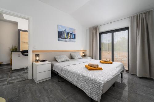 Postel nebo postele na pokoji v ubytování House Monique