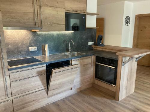 Η κουζίνα ή μικρή κουζίνα στο Ferienwohnung Steinacherhof