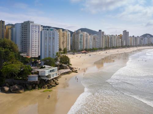 an aerial view of a beach with buildings at Tombo Beach in Guarujá